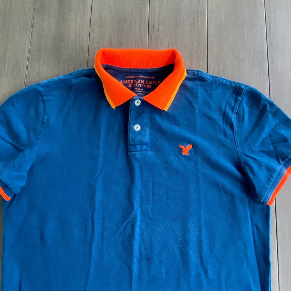American Eagle Athletic Fit Polo • Medium • Navy Pique • Orange Logo